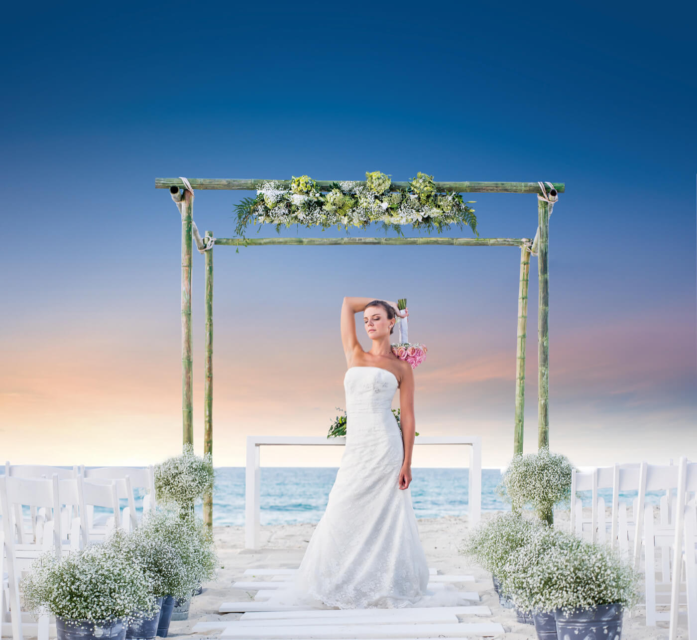 Terrace altar with red flower decoration and branches by the sea at the Grand Oasis Cancun Hotel