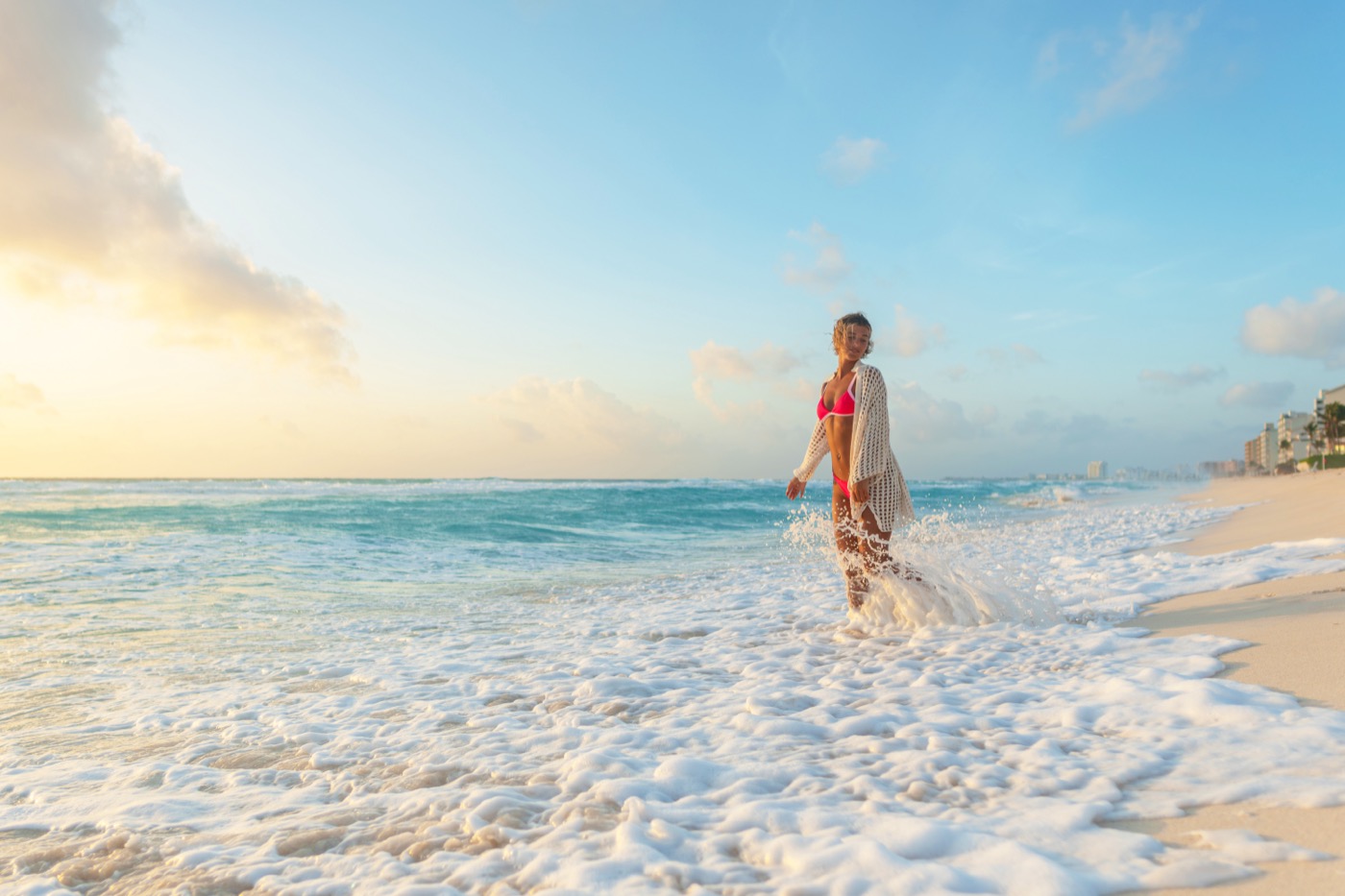 Beach in front of Grand Oasis Cancun Hotel with waves